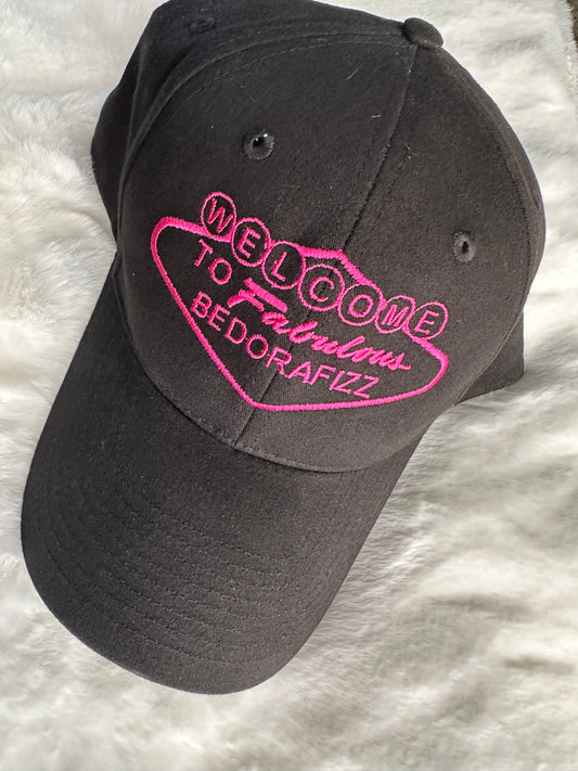 Black hat with pink logo